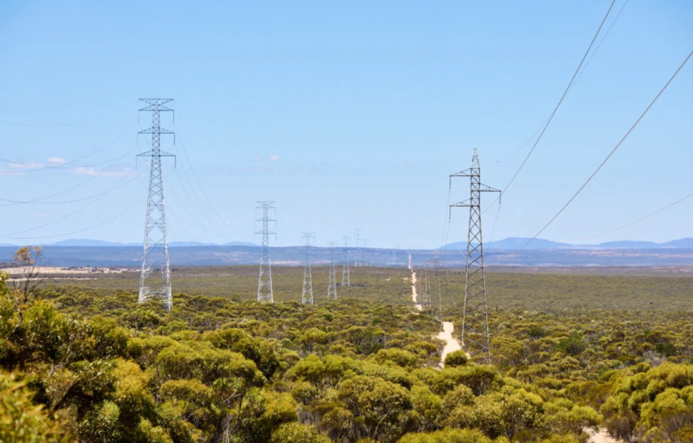Artist’s rendering of a track of power lines set against a Queensland rural landscape connected to the approved Windy Plains Renewable Energy Park