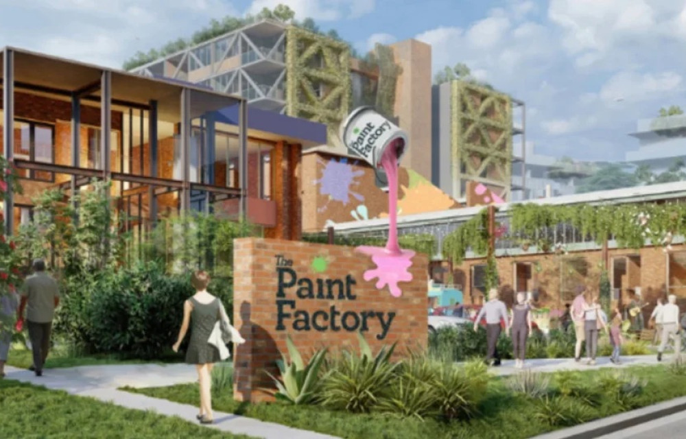 A mixed-use precinct redevelopment with residential towers, creative spaces and landscaped public areas in an urban setting.