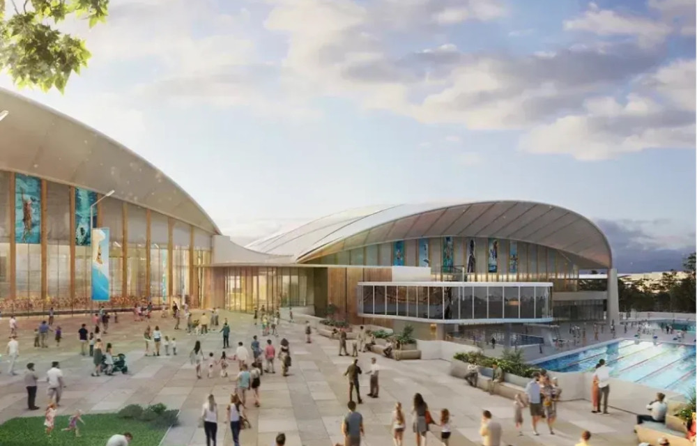Artist impression of a modern aquatic sports complex with stadium seating and Olympic-standard swimming facilities in Brisbane.